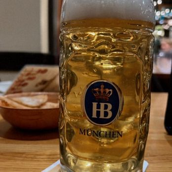 Munich Haus - a mug of beer on a table - German Near Me - Chicopee, Massachusetts Munich Haus - a mug of beer on a table - German Near Me - Chicopee, Massachusetts