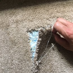 Before... Huge tear in newly installed wall to wall carpet! Before... Huge tear in newly installed wall to wall carpet!