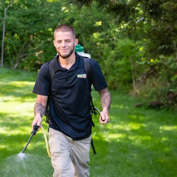 Royse Lawn Care - a man spraying a lawn - Lawn Services Near Me - Batavia, Ohio Royse Lawn Care - a man spraying a lawn - Lawn Services Near Me - Batavia, Ohio