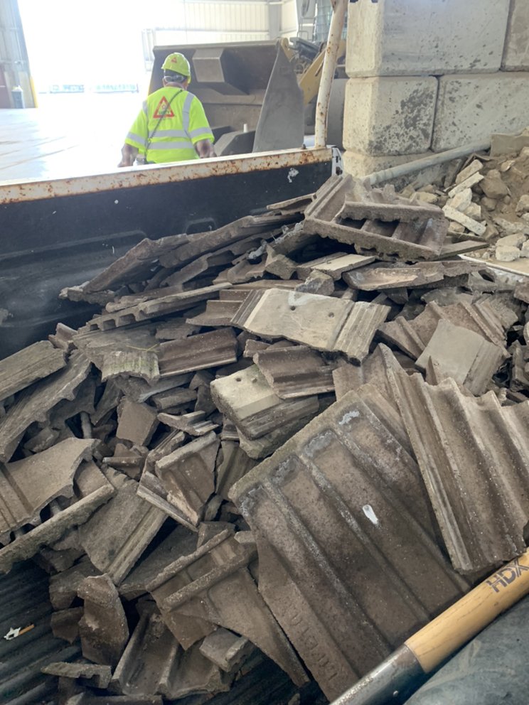 Slide of Century Roofing Company