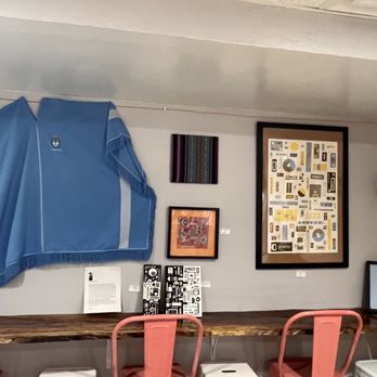 Tango Pastry - a blue jacket hanging on a wall - Bakeries Near Me - Vienna, Virginia Tango Pastry - a blue jacket hanging on a wall - Bakeries Near Me - Vienna, Virginia