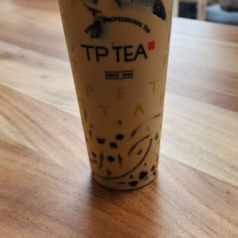 TP Tea - a cup of tea on a table - Bubble Tea Near Me - Toronto, Ontario TP Tea - a cup of tea on a table - Bubble Tea Near Me - Toronto, Ontario