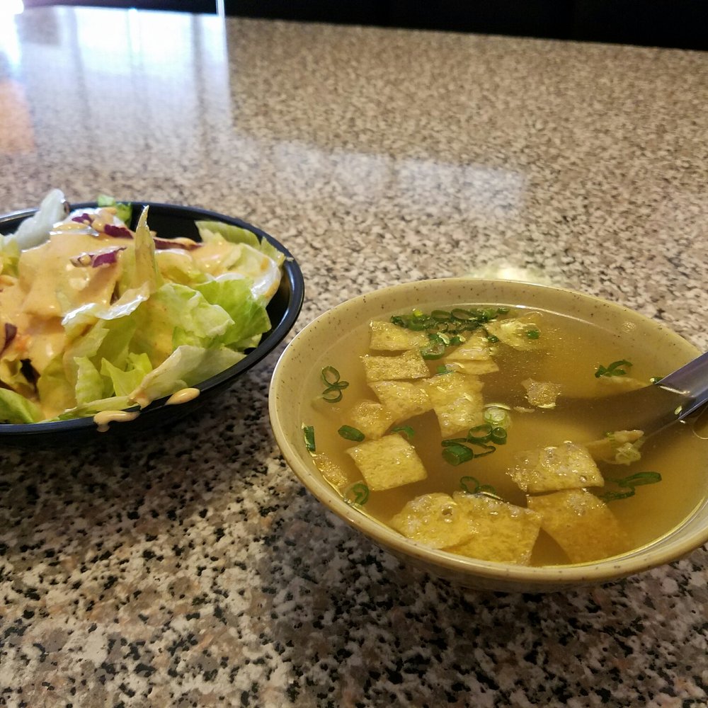 Soup with crispy wontons and green onion and lettuce salad with ginger dressing.  Very good!
