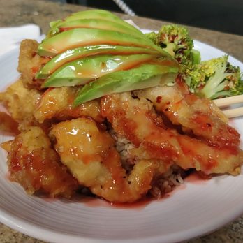 Lucky Sushi Bar - a plate of food with chopsticks - Sushi Bars Near Me - Edinburg, Texas Lucky Sushi Bar - a plate of food with chopsticks - Sushi Bars Near Me - Edinburg, Texas