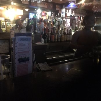 Merrill Cocktail Lounge - a bar with a man sitting at the bar - Dive Bars Near Me - East Providence, Rhode Island Merrill Cocktail Lounge - a bar with a man sitting at the bar - Dive Bars Near Me - East Providence, Rhode Island