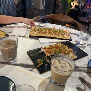 The Stray - Buffalo chicken flat bread, salted caramel cold latte, and cold chai spiced tea - Coffee Roasteries Near Me - Grand Rapids, Michigan The Stray - Buffalo chicken flat bread, salted caramel cold latte, and cold chai spiced tea - Coffee Roasteries Near Me - Grand Rapids, Michigan
