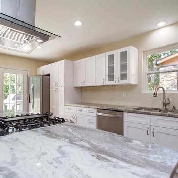 Akels Carpet One Floor & Home - a kitchen with marble countertops and white cabinets - Carpeting Near Me - Little Rock, Arkansas Akels Carpet One Floor & Home - a kitchen with marble countertops and white cabinets - Carpeting Near Me - Little Rock, Arkansas