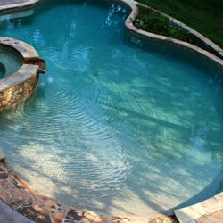 Campbell's Pool & Spa - Inground gunite pool with spa, scupper, & beach entry.