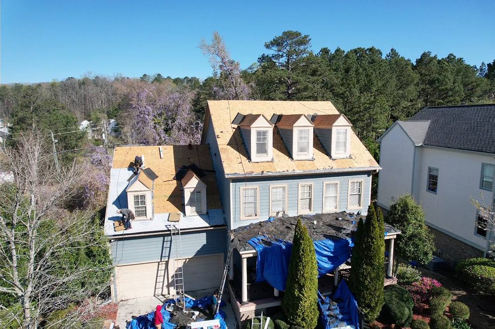 Slide of EXT Roofing Services