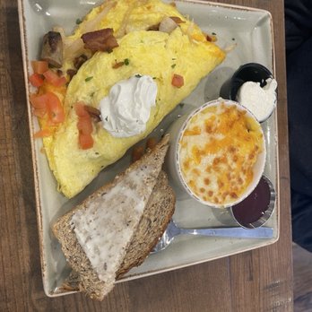 First Watch - The works omelette and grits with cheese - Cafes Near Me - Jacksonville, Florida First Watch - The works omelette and grits with cheese - Cafes Near Me - Jacksonville, Florida