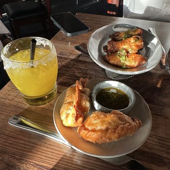 La Estancia Steakhouse - Chicken Wings (6 Pc) and Empanada - Steakhouses Near Me - Minneapolis, Minnesota