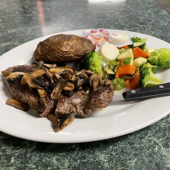 Roberts Restaurant - Strip steak, mushrooms, baked potato and veggies. - American Near Me - Salt Lake City, Utah