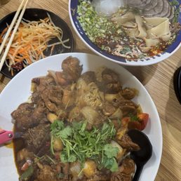 Spicy Big Plate Chicken Over Flat Noodles and Braised Beef Noodle Soup Spicy Big Plate Chicken Over Flat Noodles and Braised Beef Noodle Soup