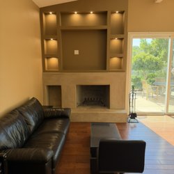 Precision Electrical - Added accent lighting to the fire place