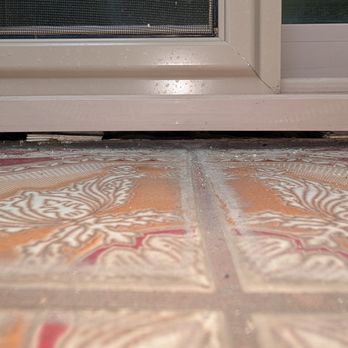 Irwindale Windows Co - Gap under sliding door due to no flashing/sealant/sill pan - Windows Installation Near Me - Irwindale, California Irwindale Windows Co - Gap under sliding door due to no flashing/sealant/sill pan - Windows Installation Near Me - Irwindale, California