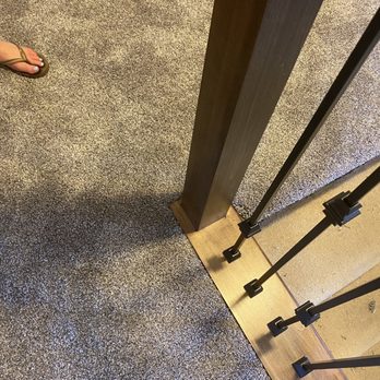 Nor Cal Stairs & Construction - a person standing on the stairs - Flooring Near Me - Gilroy, California Nor Cal Stairs & Construction - a person standing on the stairs - Flooring Near Me - Gilroy, California