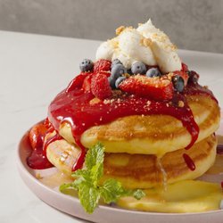 The Glass Knife - Park Avenue - Tripe Berry Pancakes -  pillowy skillet-baked buttermilk pancakes, topped generously with macerated berries and whipped marscapone.