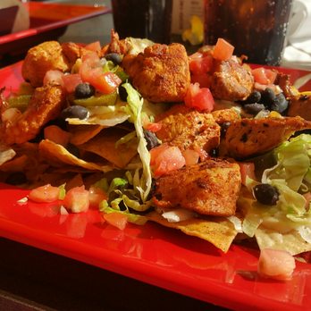 Tin Lizzy's Cantina - Nachos with chicken, tomatoes, and beans added - Tex-Mex Near Me - Marietta, Georgia Tin Lizzy's Cantina - Nachos with chicken, tomatoes, and beans added - Tex-Mex Near Me - Marietta, Georgia