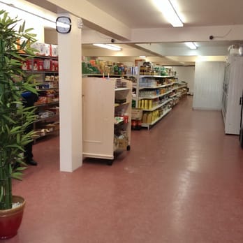Lin Asian Market - store shelves and a plant - International Grocery Near Me - Buffalo, New York Lin Asian Market - store shelves and a plant - International Grocery Near Me - Buffalo, New York