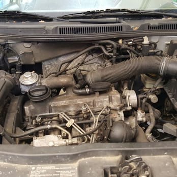 VW Specialties - Broken engine mount bolts, engine had dropped about 4 inches rusulting in a cracked oil pan. - Auto Repair Near Me - Weaverville, North Carolina VW Specialties - Broken engine mount bolts, engine had dropped about 4 inches rusulting in a cracked oil pan. - Auto Repair Near Me - Weaverville, North Carolina