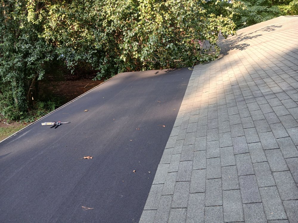 Slide of YLS Lopez Roofing Solutions