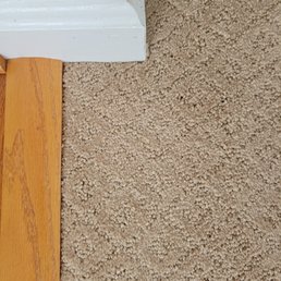 a close up of a hardwood floor a close up of a hardwood floor