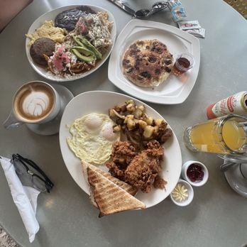 Harry's Restaurant - Spicy Fried Chicken Plate & Chilaquiles Divorciados (Spicy) & hotcake with banana and chocolate chips - Breakfast & Brunch Near Me - Houston, Texas