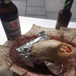 Barbacoa burrito and a beer Barbacoa burrito and a beer