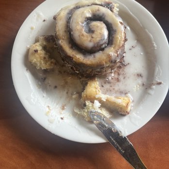 Granny’s Kitchen - This is/was a partially eaten cinnamon roll. - Breakfast & Brunch Near Me - Oklahoma City, Oklahoma Granny’s Kitchen - This is/was a partially eaten cinnamon roll. - Breakfast & Brunch Near Me - Oklahoma City, Oklahoma