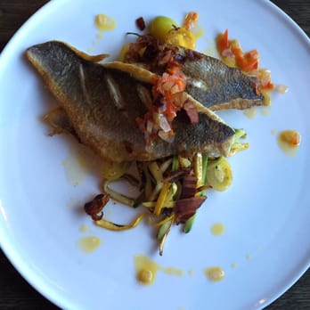 Branca - Branzino a la plancha, crispy house-cured pancetta, summer vegetables, soffritto. $28 - Cocktail Bars Near Me - Pittsford, New York Branca - Branzino a la plancha, crispy house-cured pancetta, summer vegetables, soffritto. $28 - Cocktail Bars Near Me - Pittsford, New York