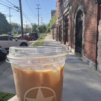 Rising Star Coffee Roasters - Latte outside - Coffee Roasteries Near Me - Cleveland, Ohio