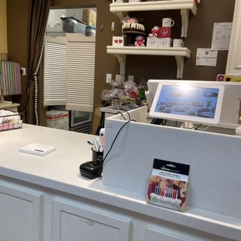 Nothing Bundt Cakes - a kitchen counter with a laptop on it - Bakeries Near Me - Scottsdale, Arizona Nothing Bundt Cakes - a kitchen counter with a laptop on it - Bakeries Near Me - Scottsdale, Arizona