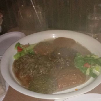 Abyssinia - What's not clear in this lousy pic is that the dish is about 2' in diameter. Very nice way to eat with close friends - Ethiopian Near Me - Philadelphia, Pennsylvania Abyssinia - What's not clear in this lousy pic is that the dish is about 2' in diameter. Very nice way to eat with close friends - Ethiopian Near Me - Philadelphia, Pennsylvania