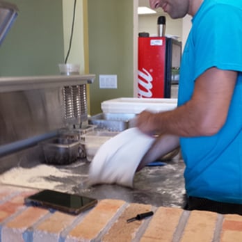 Bonta - Forming the pizza crust. - Cafes Near Me - Lincolnshire, Illinois