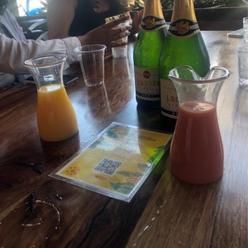 The Duck Dive - Bottles one and two of bottomless mimosas, ft. Guava and orange juice - Sports Bars Near Me - San Diego, California The Duck Dive - Bottles one and two of bottomless mimosas, ft. Guava and orange juice - Sports Bars Near Me - San Diego, California