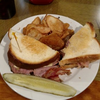 Bluff City Grill - Pigs in a blanket sandwich with house made chips - American Near Me - Alton, Illinois