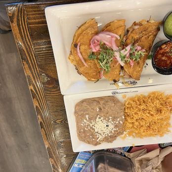 Cantina Louie - Quesagbirria Tacos with a side of Spanish Rice and Refried Beans - Mexican Near Me - Jacksonville, Florida