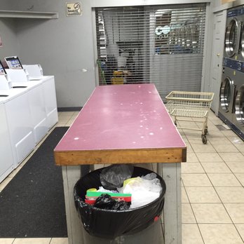 Rocco's Laundromat - Folding area, actually was clean despite lack of appeal - Laundromat Near Me - Albany, New York