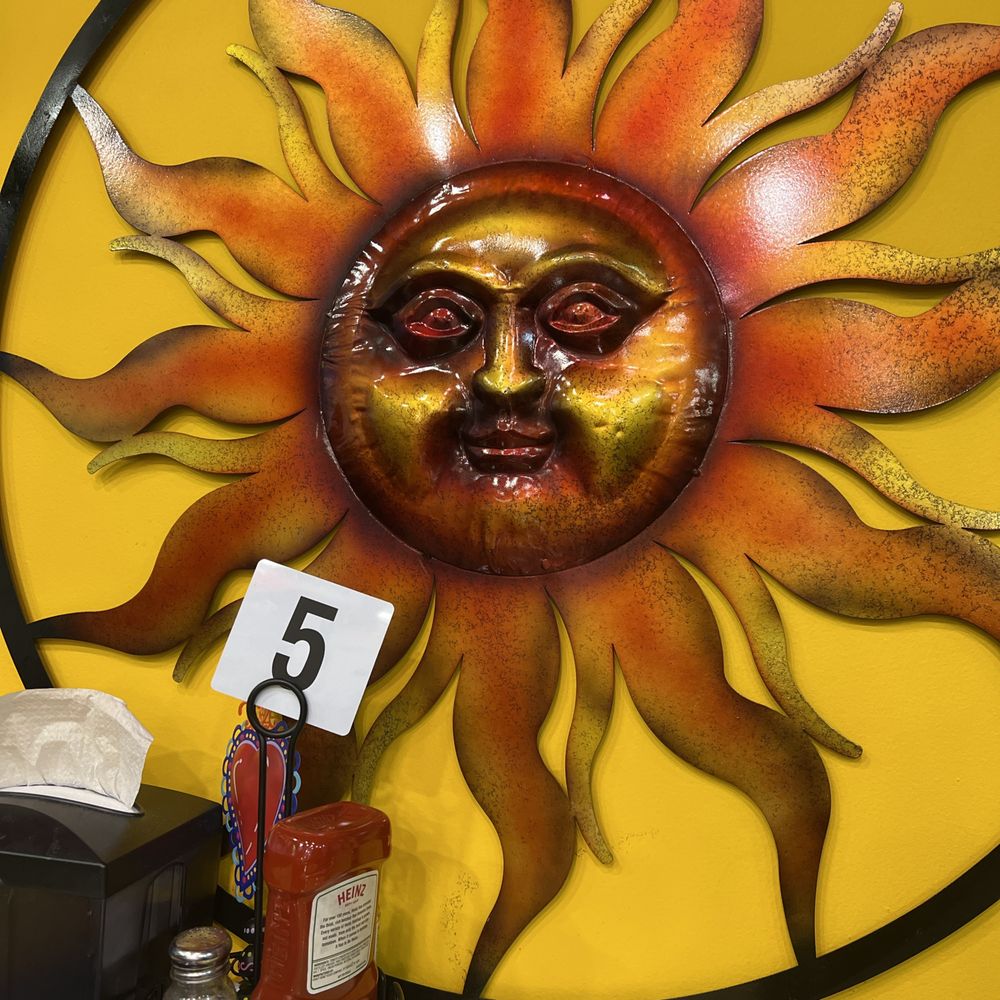 a sun with a face a sun with a face