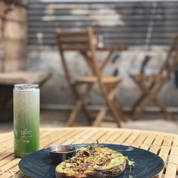 Blueys Kitchen - View from outdoor seating. Sweet Halloumi Toast with wild honey on the side, and one of their healthy packaged beverages. - Cafes Near Me - Santa Monica, California Blueys Kitchen - View from outdoor seating. Sweet Halloumi Toast with wild honey on the side, and one of their healthy packaged beverages. - Cafes Near Me - Santa Monica, California