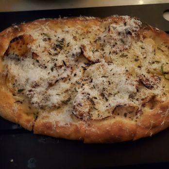 Serious Pie Downtown - Yukon gold potato, pecorino romano, rosemary pizza - Pizza Near Me - Seattle, Washington