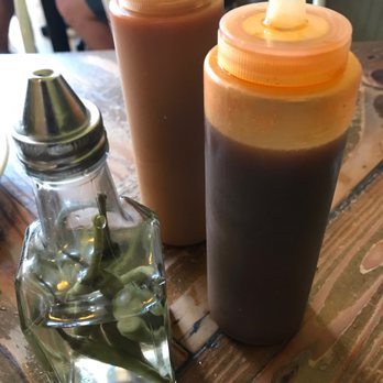 Revival - Thai chili oil, and signature sauce - Southern Near Me - Minneapolis, Minnesota Revival - Thai chili oil, and signature sauce - Southern Near Me - Minneapolis, Minnesota
