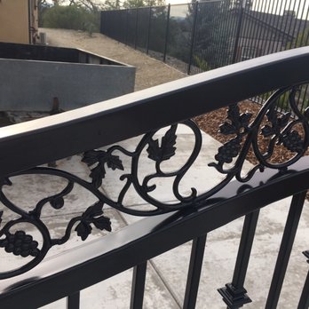 Robinson's Ornamental Iron Works - The scrollwork and vineyard accents on our gate - Fences & Gates Near Me Robinson's Ornamental Iron Works - The scrollwork and vineyard accents on our gate - Fences & Gates Near Me