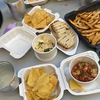 Charleston’s Smallest Bar - Crab dip with grilled bread, shrimp ceviche with chips, fries, congrejo ceviche (scallop & crab), and shrimp cocktail. All delicious! - Bars Near Me - Charleston, South Carolina