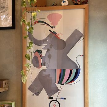 Balancero - elephant on a unicycled bicycle - Coffee & Tea Near Me - Astoria, New York