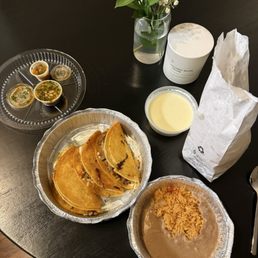 Leos Birria Tacos Combo with side of queso and chips Leos Birria Tacos Combo with side of queso and chips
