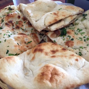 Naan N Masala - Garlic naan + the free plain naan I got with my Yelp checkin!! - Indian Near Me - Milpitas, California Naan N Masala - Garlic naan + the free plain naan I got with my Yelp checkin!! - Indian Near Me - Milpitas, California
