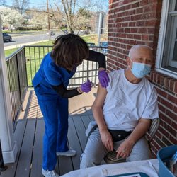 Olney Medical Associates - Giving COVID Vaccination
