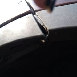 Complete Automotive Solutions - More sheet metal screws holding fender in place.