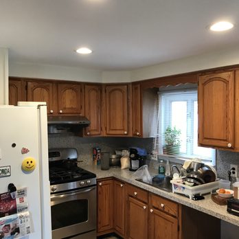Marcelis Contracting - a kitchen with a refrigerator, stove, and sink - General Contractors Near Me - Philadelphia, Pennsylvania Marcelis Contracting - a kitchen with a refrigerator, stove, and sink - General Contractors Near Me - Philadelphia, Pennsylvania